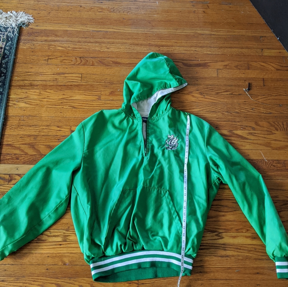 Green cheerleading jacket.